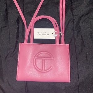 this bag is the Telfar small shopping bag in the shade corned beef